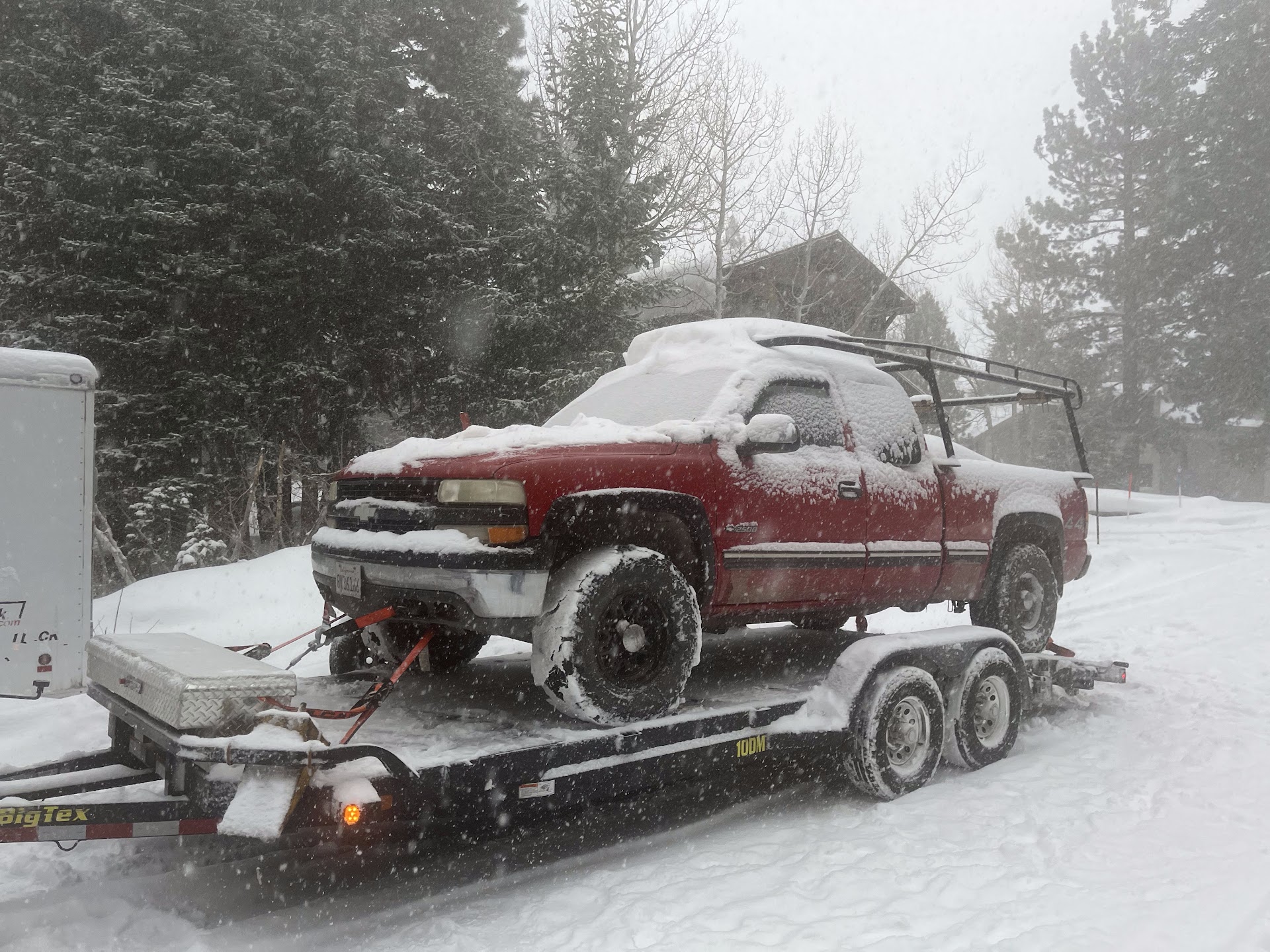 Towing truck in the snow in Mammoth Lakes, CA